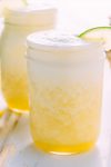 a blended fresh pineapple margarita sweetened naturally with honey! refreshing and easy to make at home, this drink will have you doing the happy dance! | www.nyssaskitchen.com