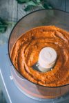 fast + easy romesco sauce - a flavor packed, versatile sauce packed with roasted red peppers, almonds, garlic, olive oil, parsley and smoked paprika. a brilliant way to add that extra something special to your savory dishes! | www.nyssaskitchen.com