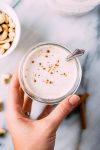 easy cinnamon cashew milk is the perfect non-dairy milk alternative that you'll be craving daily! So delicious and made with only 5 ingredients this nut milk is sure to find a happy place in your kitchen. | www.nyssaskitchen.com