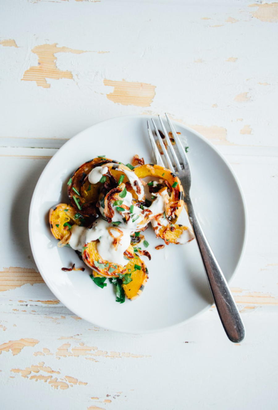 roasted delicata squash with fried shallots, herbs and salted brown butter yogurt | www.nyssaskitchen.com