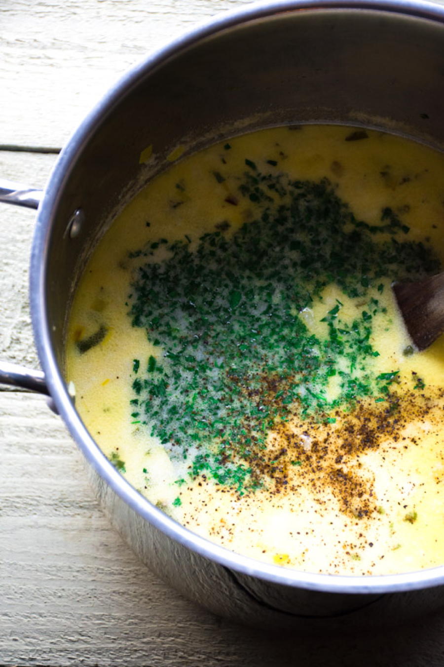 a quick and simple recipe for creamy potato soup with parsley, leeks and fennel. easy to make and a perfect way to warm up on a cold winter's night! | www.nyssaskitchen.com