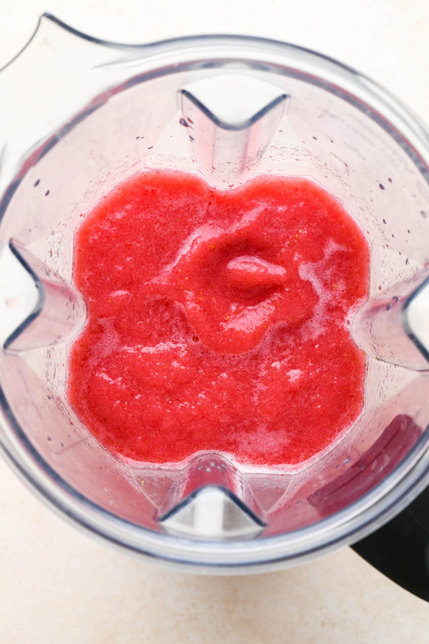 How to make Strawberry Hibiscus Slushies: Blended slushy in blender container.
