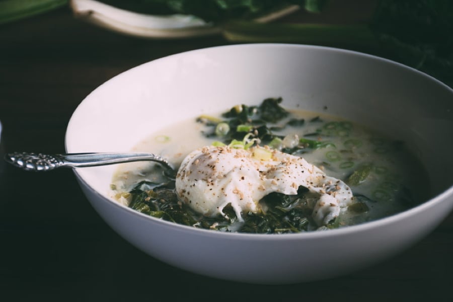 chard coconut detox soup with poached eggs: a vibrant and restorative soup made with chard, onion, fennel, celery and garlic, and paired with a nutritionally dense bone broth or vitamin rich vegetable stock + poached eggs to detox and support your body from the inside out! | www.nyssaskitchen.com