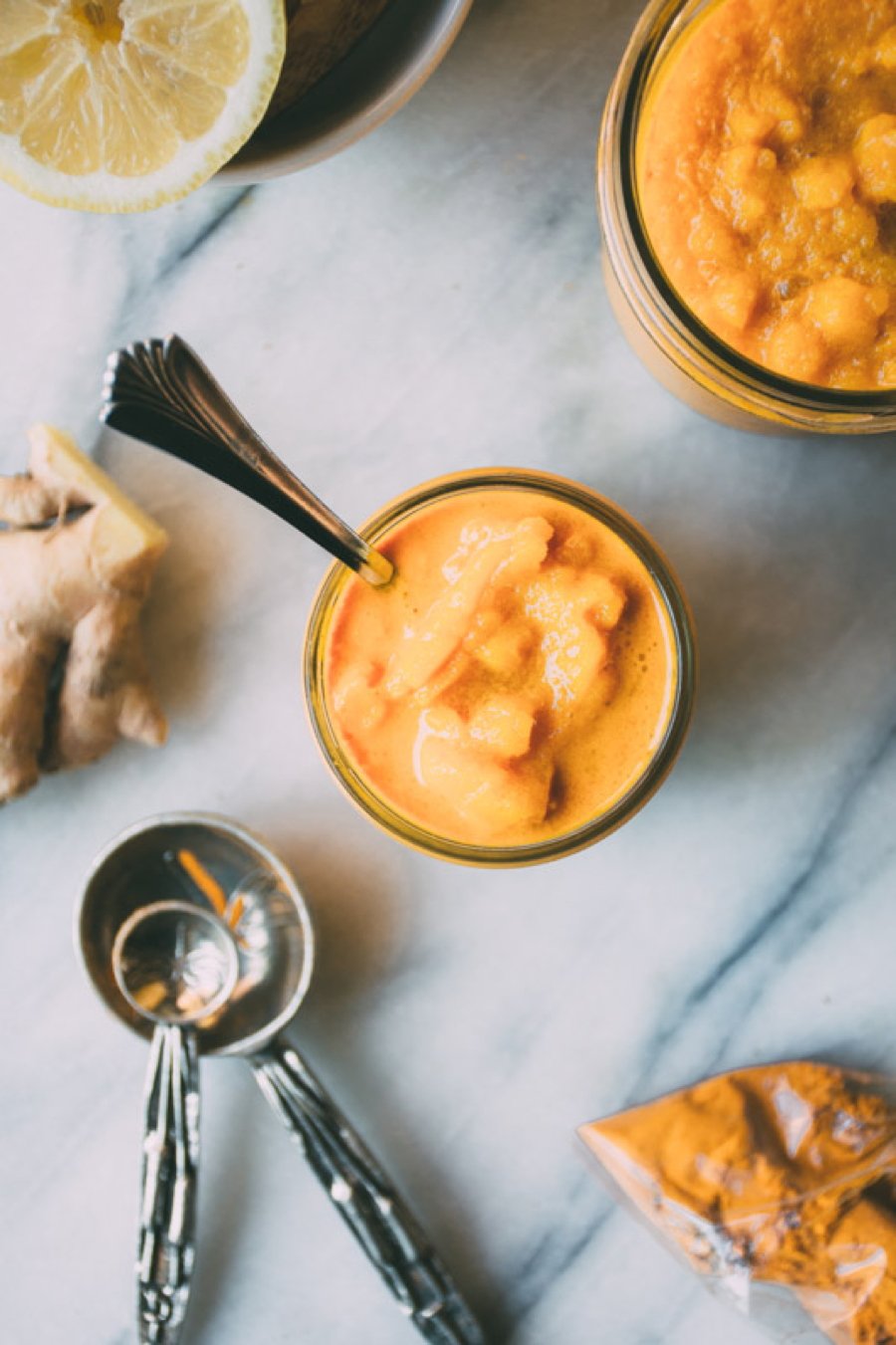 spicy animal slushy is healthy summer refreshment at its finest! this icy treat is made with fresh pressed apple cider, lemon juice, ginger, turmeric and cayenne - packed with anti-inflammatory and immune boosting goodness | www.nyssaskitchen.com