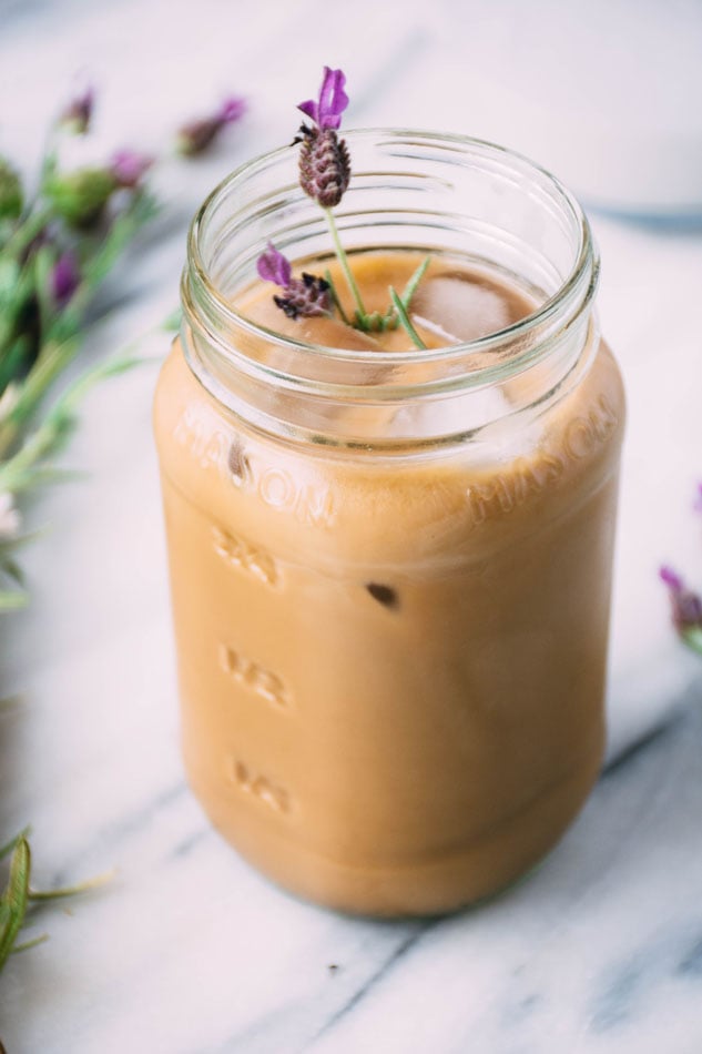 lavender coconut iced coffee is a delightfully easy, dairy free homemade fancy coffee recipe perfect for the late summer months. made with coconut milk, lavender, iced coffee and coconut sugar or honey. | www.nyssaskitchen.com