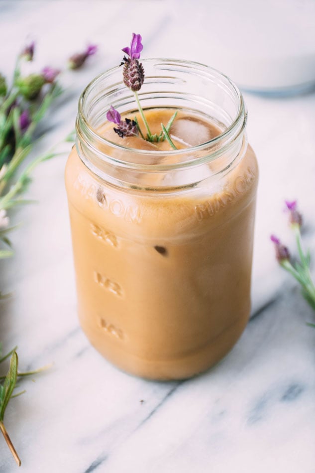 lavender coconut iced coffee is a delightfully easy, dairy free homemade fancy coffee recipe perfect for the late summer months. made with coconut milk, lavender, iced coffee and coconut sugar or honey. | www.nyssaskitchen.com