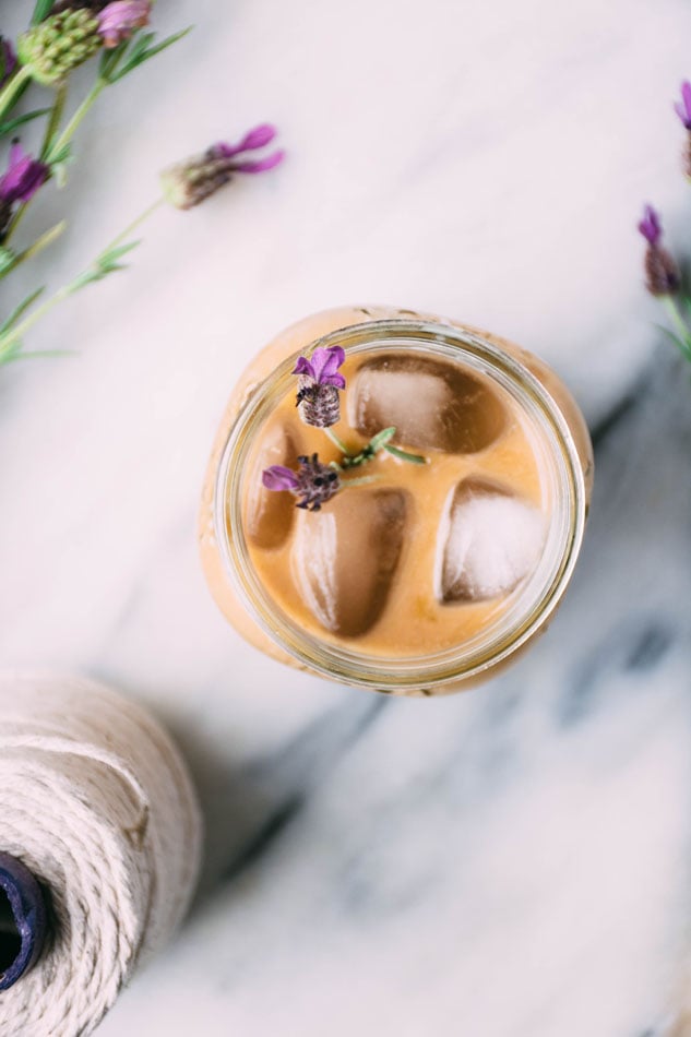 lavender coconut iced coffee is a delightfully easy, dairy free homemade fancy coffee recipe perfect for the late summer months. made with coconut milk, lavender, iced coffee and coconut sugar or honey. | www.nyssaskitchen.com