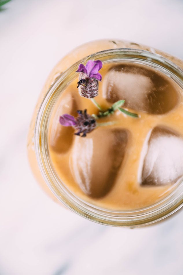 lavender coconut iced coffee is a delightfully easy, dairy free homemade fancy coffee recipe perfect for the late summer months. made with coconut milk, lavender, iced coffee and coconut sugar or honey. | www.nyssaskitchen.com