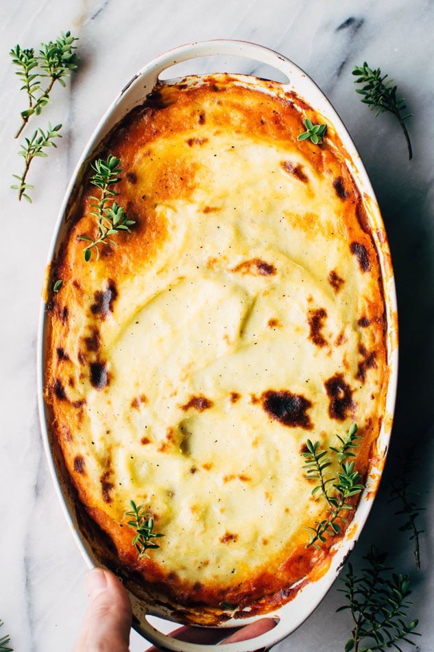 Paleo italian shepherds pie with bolognese sauce and whipped parsnips! A delicious and easy casserole packed full of veggies and delicious flavors - perfect for a healthy cold weather dinner!