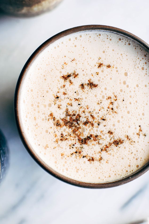 Bulletproof rooibos cardamom blender lattes! These fancy homemade drinks are a frothy, creamy dream - made with natural sweeteners and full of healthy fats and antioxidant + mineral rich rooibos! No fancy milk steamer required.