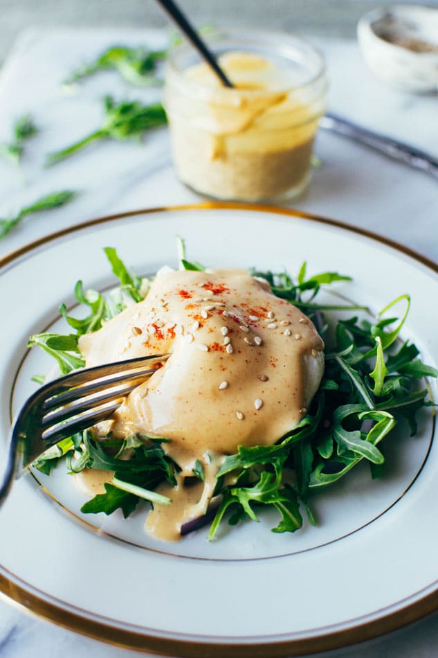 Easy dairy free tahini hollandaise sauce! So simple to make (in a blender!) and still full of healthy fats and delicious flavor for your endless list of things that you have just been waiting to drown in hollandaise goodness.