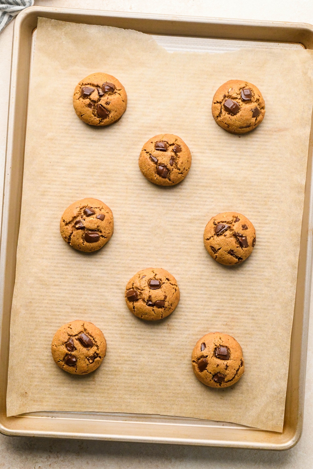 How to make Dark Chocolate Espresso Chickpea Flour Cookies: Baked cookies on parchment lined baking sheet.