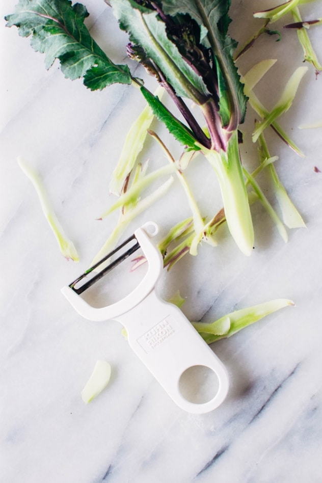 Charred purple sprouting broccoli with caper basil tahini sauce is a simple spring vegetable recipe with purple sprouting broccoli and an easy to make tahini sauce that's elevated with garlic, lemon, capers and basil, topped with some toasted sunflower seeds for crunch.