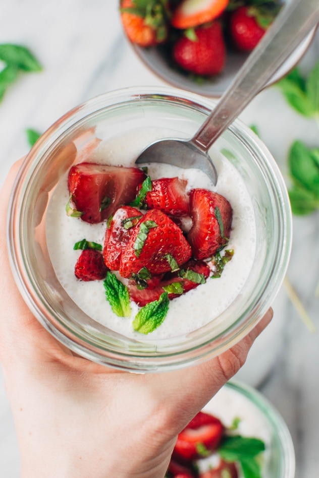 Roasted strawberries with mint and airy yogurt cream - A delightfully sweet and simple spring indulgence that's refined sugar free made with balsamic roasted strawberries, torn fresh mint, and an airy probiotic rich yogurt cream.