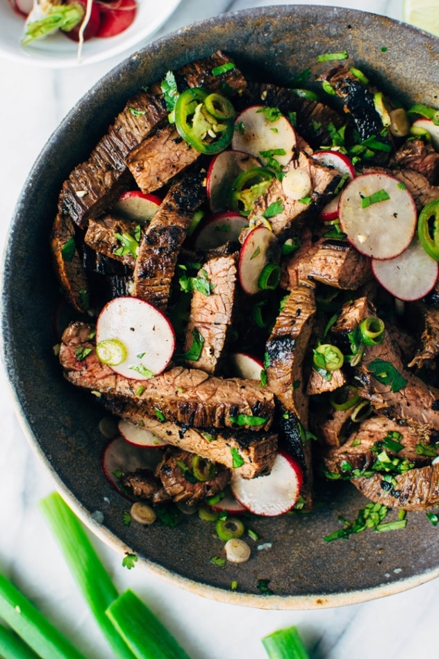 Spicy thai marinated skirt steak tacos and avocado are super bold and umami packed paleo friendly tacos that are super versatile and easy to make!