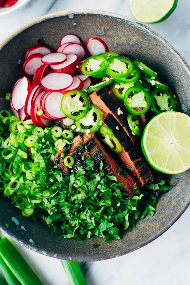 Spicy thai marinated skirt steak tacos and avocado are super bold and umami packed paleo friendly tacos that are super versatile and easy to make!