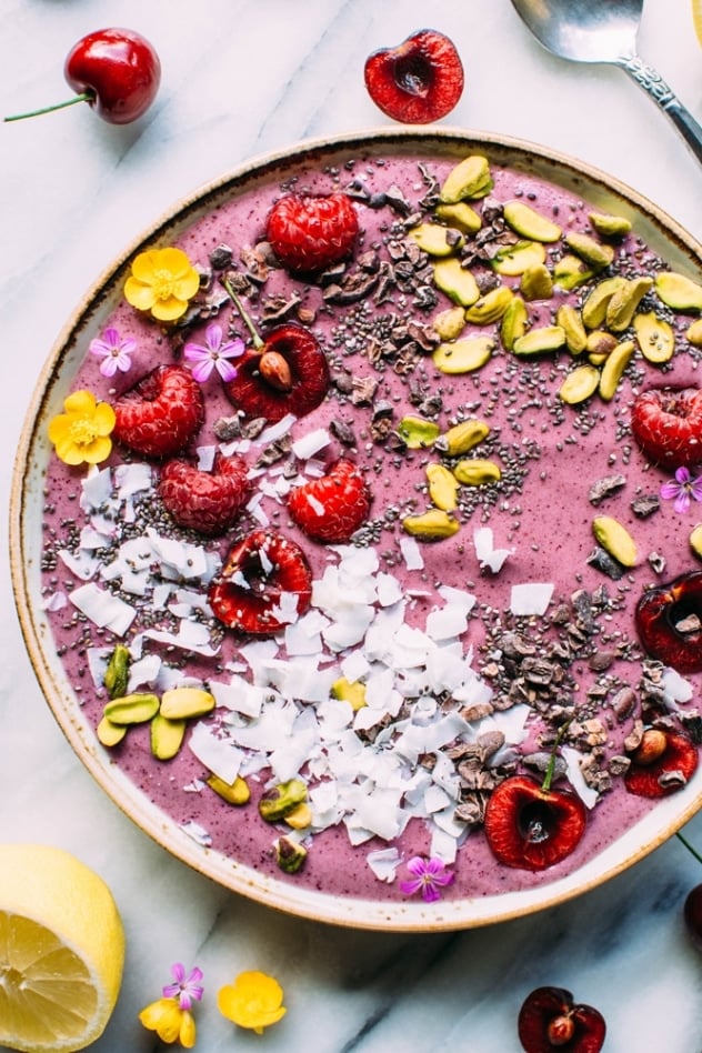 This 5 minute antioxidant smoothie bowl is packed with cherries, blueberries, banana, frozen cauliflower and collagen powder for all the glow from the inside out goodness you need!