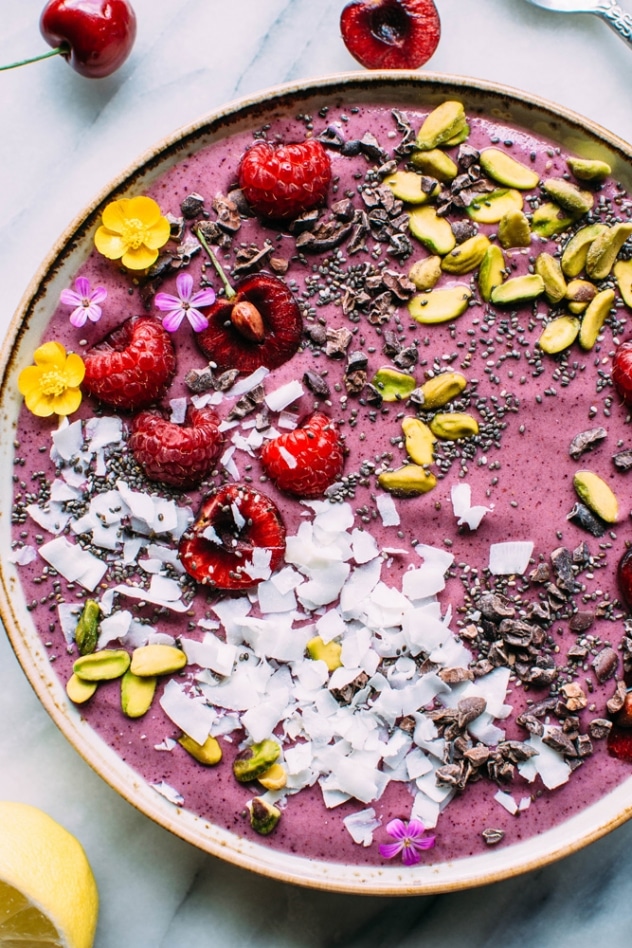 This 5 minute antioxidant smoothie bowl is packed with cherries, blueberries, banana, frozen cauliflower and collagen powder for all the glow from the inside out goodness you need!