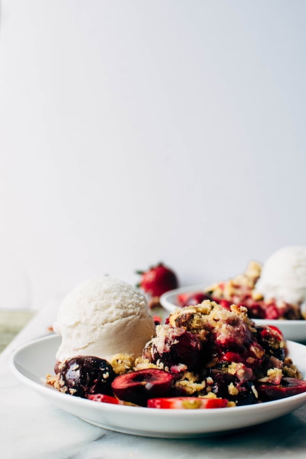 Paleo cherry strawberry crisp is the perfect simple and healthy summer treat. Free of grains, refined sugar, and processed vegetable oils, it will nourish your summer bod from the inside out!