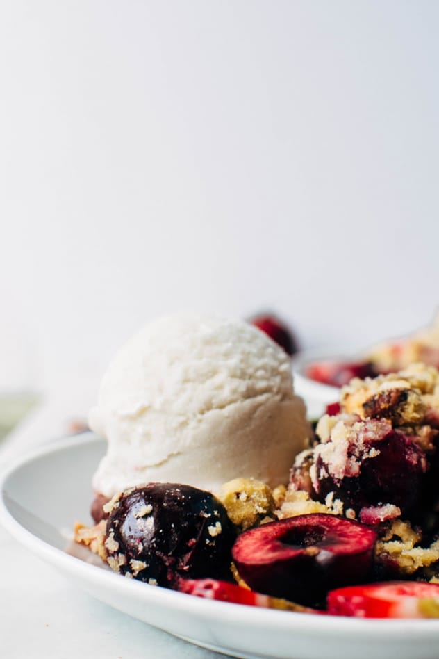 Paleo cherry strawberry crisp is the perfect simple and healthy summer treat. Free of grains, refined sugar, and processed vegetable oils, it will nourish your summer bod from the inside out!