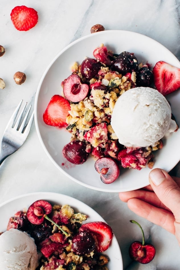 Paleo cherry strawberry crisp is the perfect simple and healthy summer treat. Free of grains, refined sugar, and processed vegetable oils, it will nourish your summer bod from the inside out!
