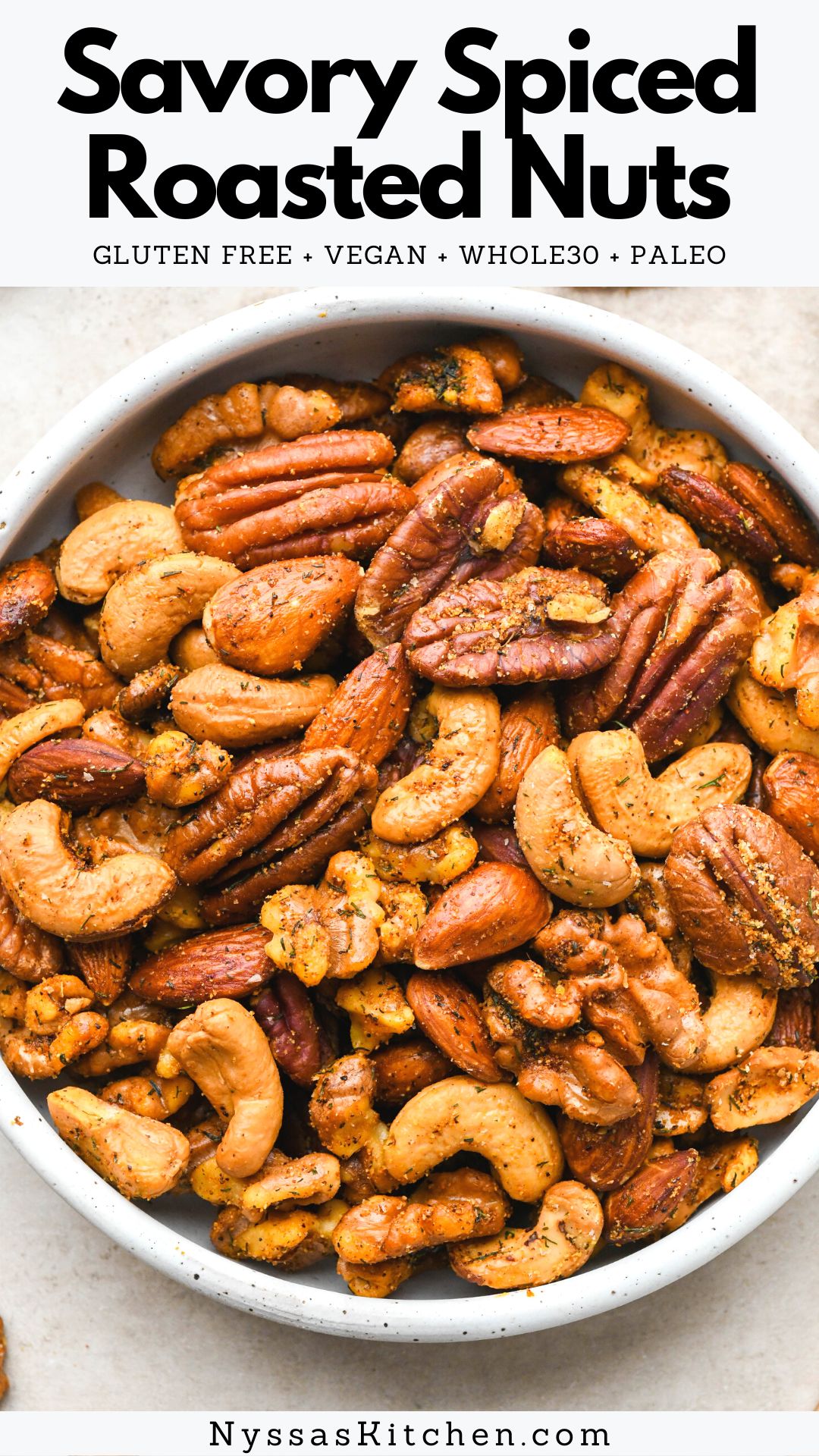Spiced roasted nuts are the easy homemade recipe you need to tie any holiday or snack spread together. Perfect to serve for Thanksgiving, Christmas, with your favorite charcuterie spread, or as an every day snack. They are perfectly seasoned with a savory seasoning blend, only take minutes to prep and less than half and hour to roast. Made with walnuts, pecans, almonds, and cashews, but easily customizable based on your preferences. Whole30, paleo, gluten free, sugar free, and vegan (no egg whites).