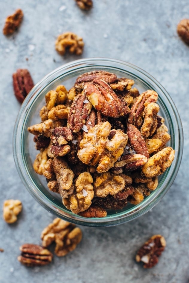 Tasty spiced snacking nuts are so easy to make and just the perfect amount of crispy bite and spice! Clean snacking at it's BEST!