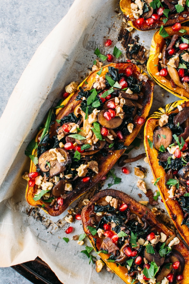 Roasted delicata squash stuffed with kale and maple cinnamon roasted mushrooms is literally bursting with brilliant seasonal flavor and color!