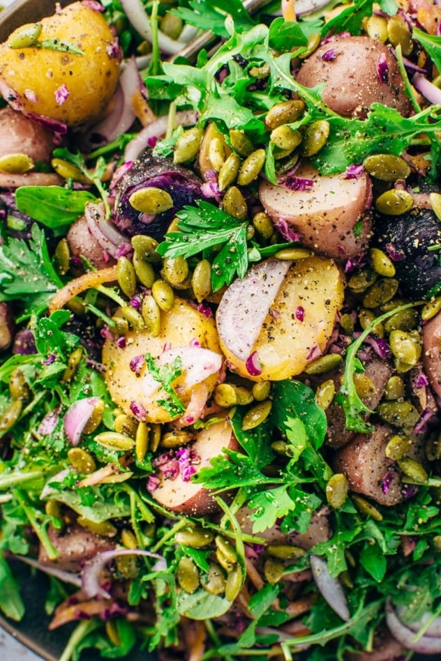 This colorful winter potato salad is loaded up with all the healthy winter veggies, and also brings a taste of what's to come with warmer weather eats! Simple to make and whole30 friendly, vegan, and paleo - a perfect dish to enjoy and share as the winter months turn to spring! 