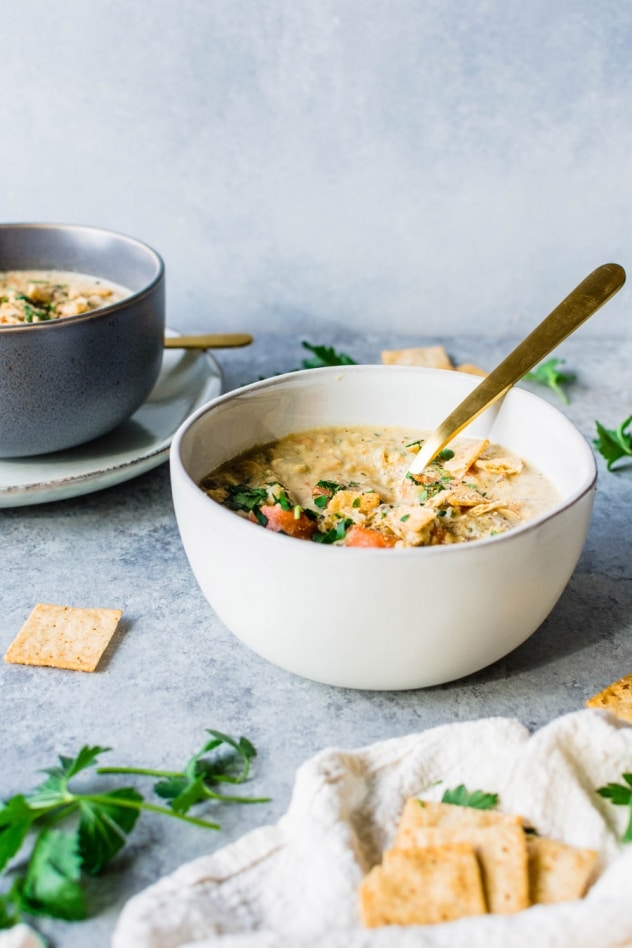 Thanks to cashew cream, this creamy dairy free chicken and cauliflower rice soup is so creamy and delicious that you would never know it was dairy free! Made with all the same flavors of a classic chicken and rice soup, but paleo, and whole30 friendly for a satisfying and healthy meal. 