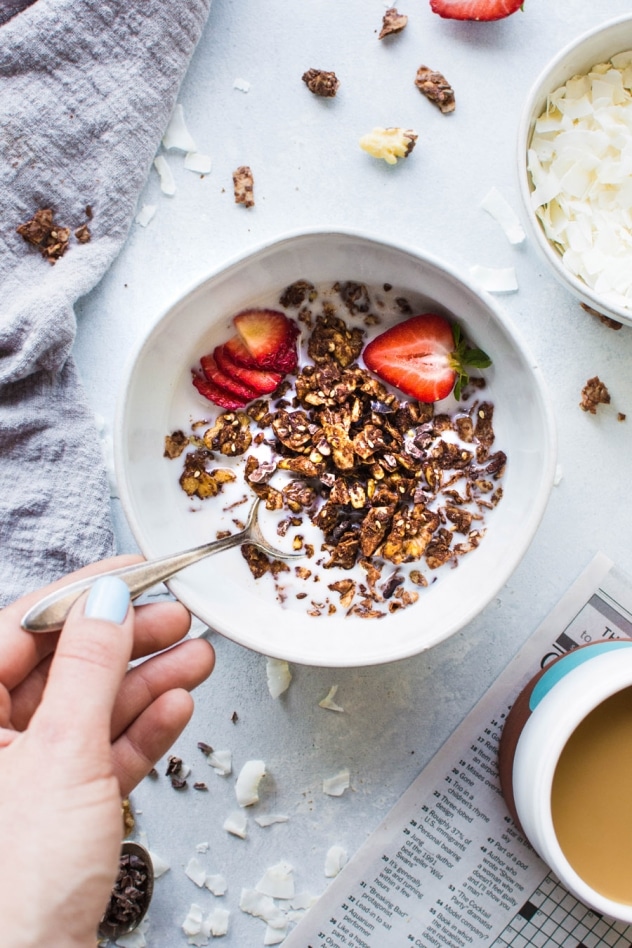 This easy dark chocolate paleo grain free granola is gluten free, dairy free, and packed with all the things you love about granola without any of the grains. Easy to make, good for you, and so freaking delicious. I know it's going to earn a fast spot in your heart and in your kitchen!