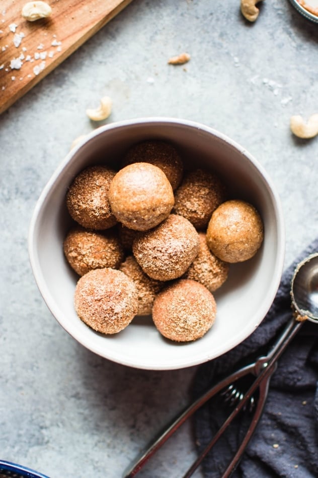 These No Bake Cinnamon Roll Energy bites are made with only 7 ingredients and are naturally sweetened with dates! A healthy yet indulgent treat, they are soft and chewy, full of healthy fats and protein, and totally reminiscent of the ultimate breakfast pastry - the cinnamon roll! Without any of the refined sugar/wheat/dairy. It's a real win/win. 