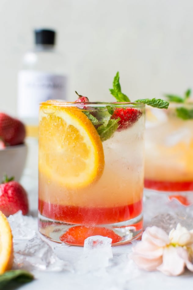 This naturally sweetened strawberry mint shrub is made with juicy seasonal strawberries, fresh mint, white balsamic vinegar, and honey! It's a brilliant bright and tart base for refreshing drinks that you'll enjoy all summer long.