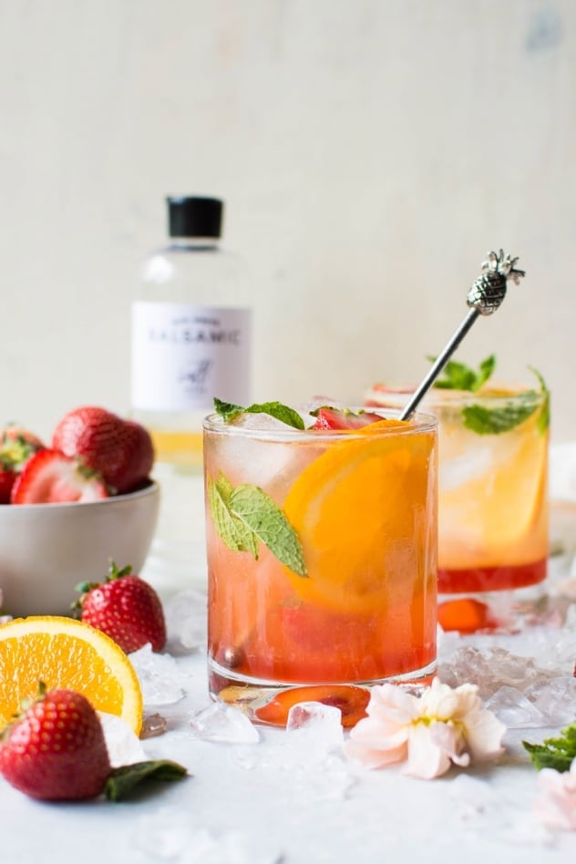 This naturally sweetened strawberry mint shrub is made with juicy seasonal strawberries, fresh mint, white balsamic vinegar, and honey! It's a brilliant bright and tart base for refreshing drinks that you'll enjoy all summer long.