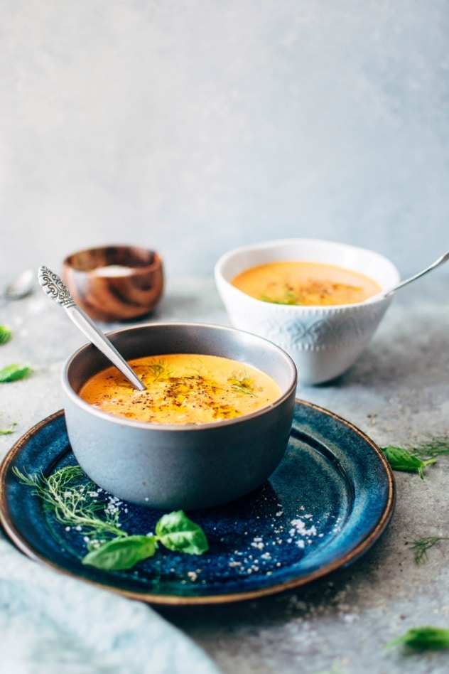 Creamy dairy free tomato and red pepper soup is naturally gluten and dairy free and bursting with summertime flavor. If there’s one soup that fits in this time of year, this tomato soup is it. Made with fresh tomatoes, sweet red pepper, lots of aromatics and soaked cashews for that ultra creamy vibe. A super healthy and comforting version of a summertime classic.