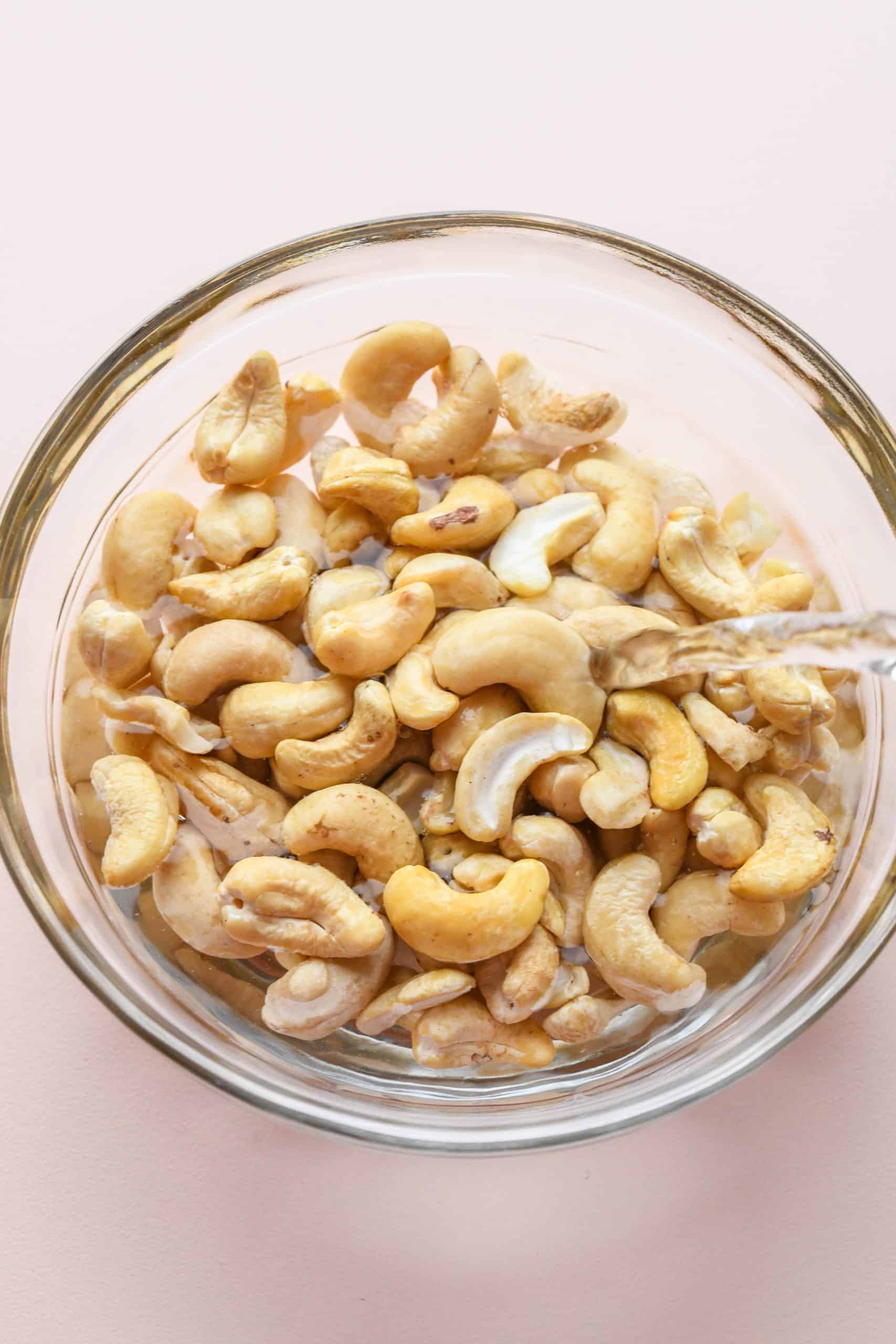 How to make cashew beet dip: Soaking cashews in water.