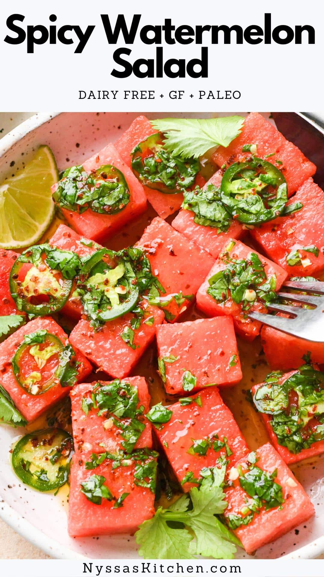 This spicy watermelon salad with cilantro and lime is a real crowd-pleasing delight during the warm summer months! It's spicy, sweet, and draped in a bright and citrusy dressing for the ultimate watermelon salad experience. Refreshing and FULL of summer flavor! GF, dairy free, vegetarian, paleo, vegan option, Whole30 option.
