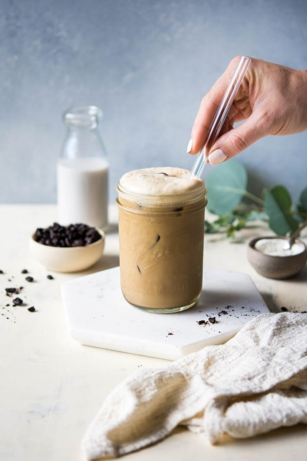 This creamy collagen boosted iced coffee is made with your favorite cold brew coffee, almond milk, maple syrup, vanilla, a pinch of sea salt, and of course, collagen! Super easy to make and a seriously delicious caffeinated pick-me-up. 