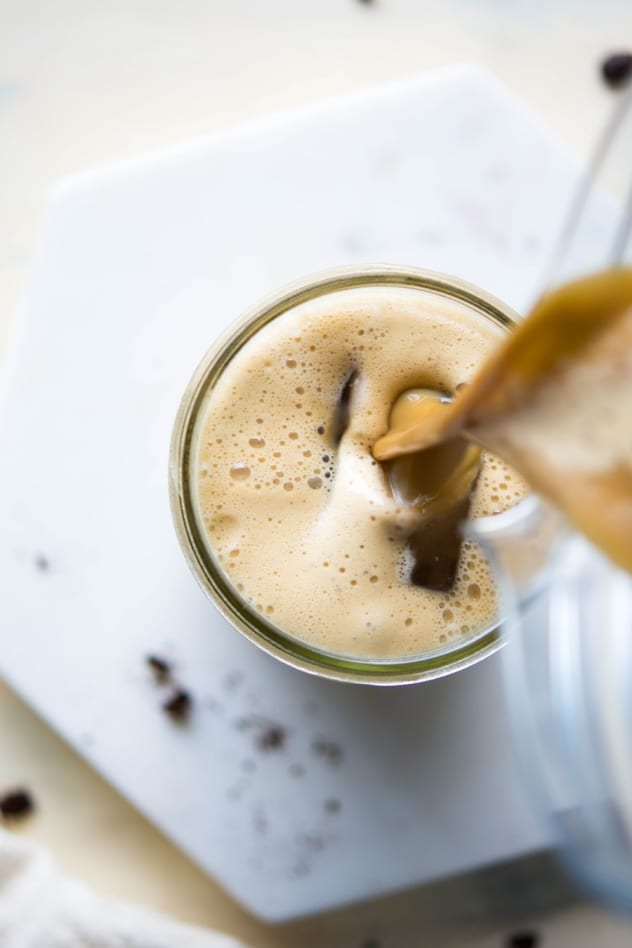 This creamy collagen boosted iced coffee is made with your favorite cold brew coffee, almond milk, maple syrup, vanilla, a pinch of sea salt, and of course, collagen! Super easy to make and a seriously delicious caffeinated pick-me-up. 