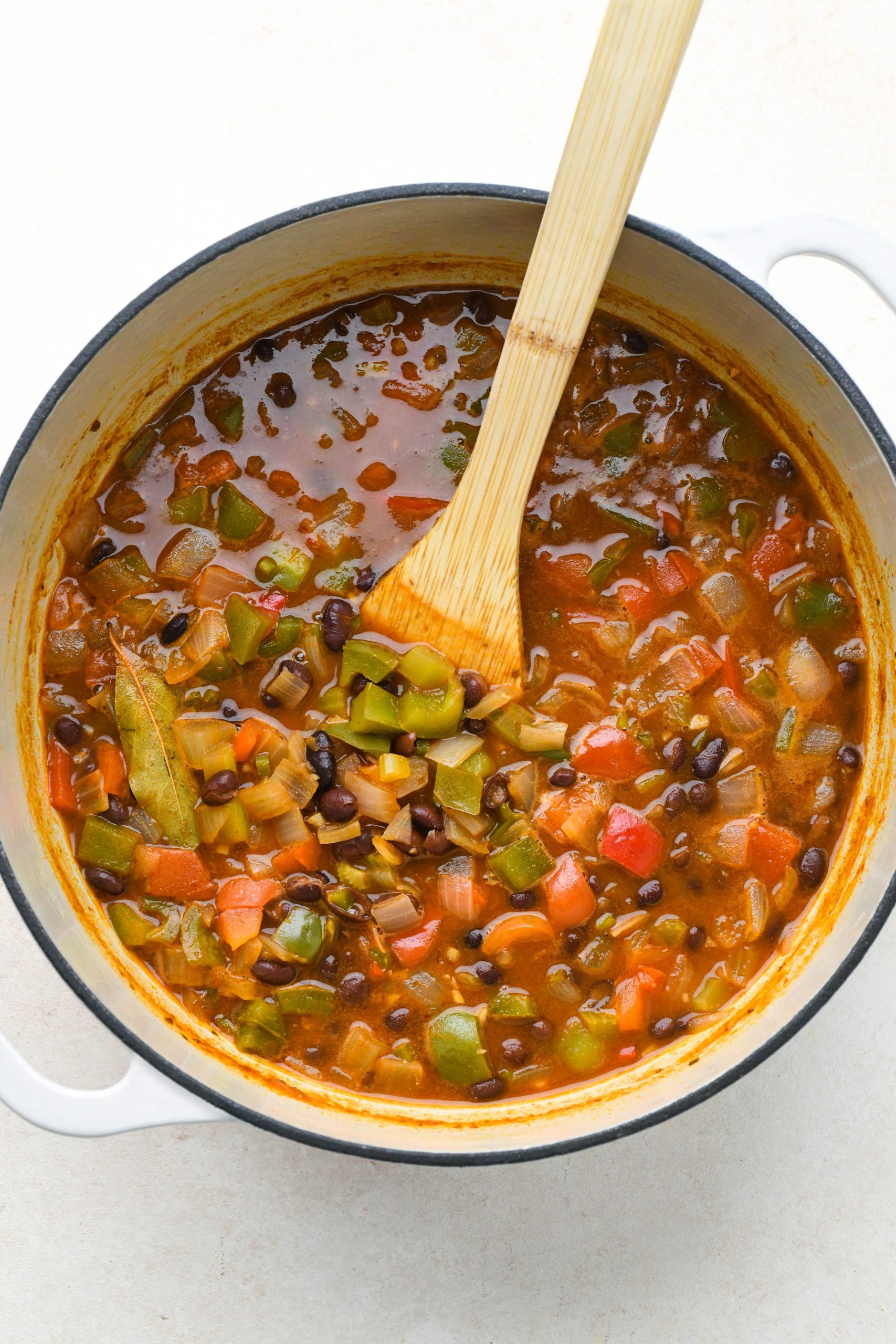 How to make vegan black bean soup: Soup simmered together, before blending.