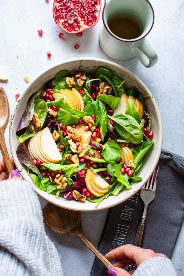 This asian pear and walnut salad with a maple mustard vinaigrette is fall salad DREAMS. Made with tender salad greens, thinly sliced asian pear, toasted walnuts, sweet pomegranate seeds, and a zippy maple mustard vinaigrette that you'll want to put on everything. 