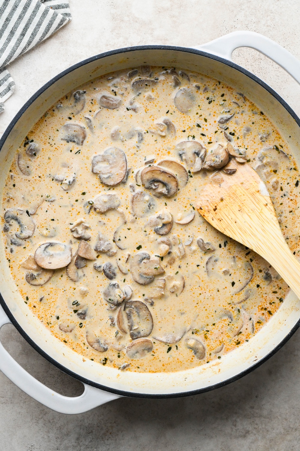 How to make Gluten Free Mushroom Gravy: Gravy in skillet before simmering to thicken and reduce.