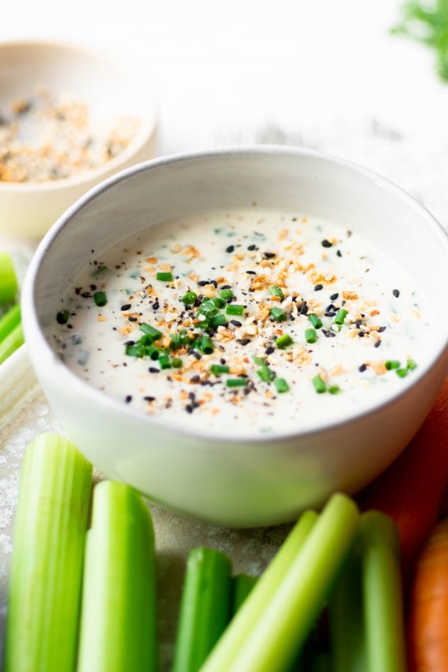 This dairy free everything bagel spiced ranch dressing is made with a few simple + clean ingredients that you probably already have in your refrigerator and pantry! Ready in 5 minutes and so delicious for dipping veggies or as a dressing for your favorite salad. A healthy and tasty alternative to store bought ranch. 