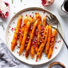 Maple Chili Glazed Carrots with Thyme and Pomegranate