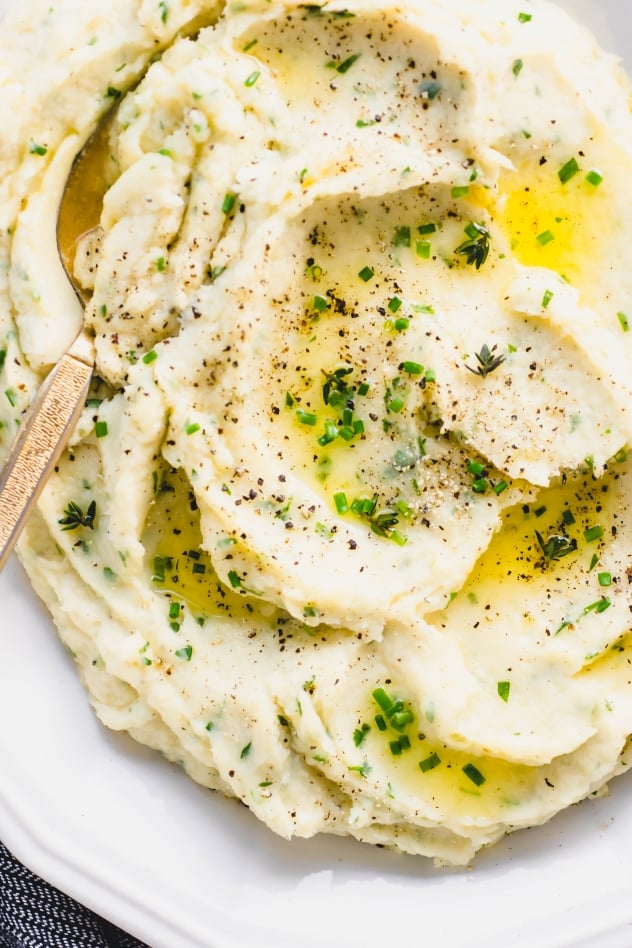 This whipped parsnip with fresh herbs recipe is a delicious alternative to mashed potatoes! A crave worthy seasonal side dish that is perfect for the holidays or a cozy comfort food meal at home. Paleo, gluten free and with a vegan option!