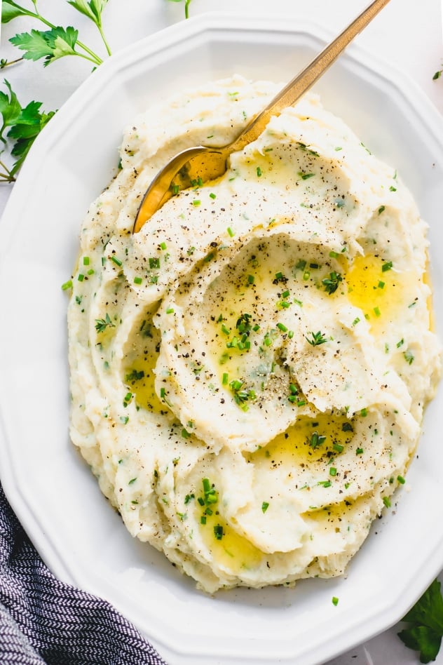 This whipped parsnip with fresh herbs recipe is a delicious alternative to mashed potatoes! A crave worthy seasonal side dish that is perfect for the holidays or a cozy comfort food meal at home. Paleo, gluten free and with a vegan option!