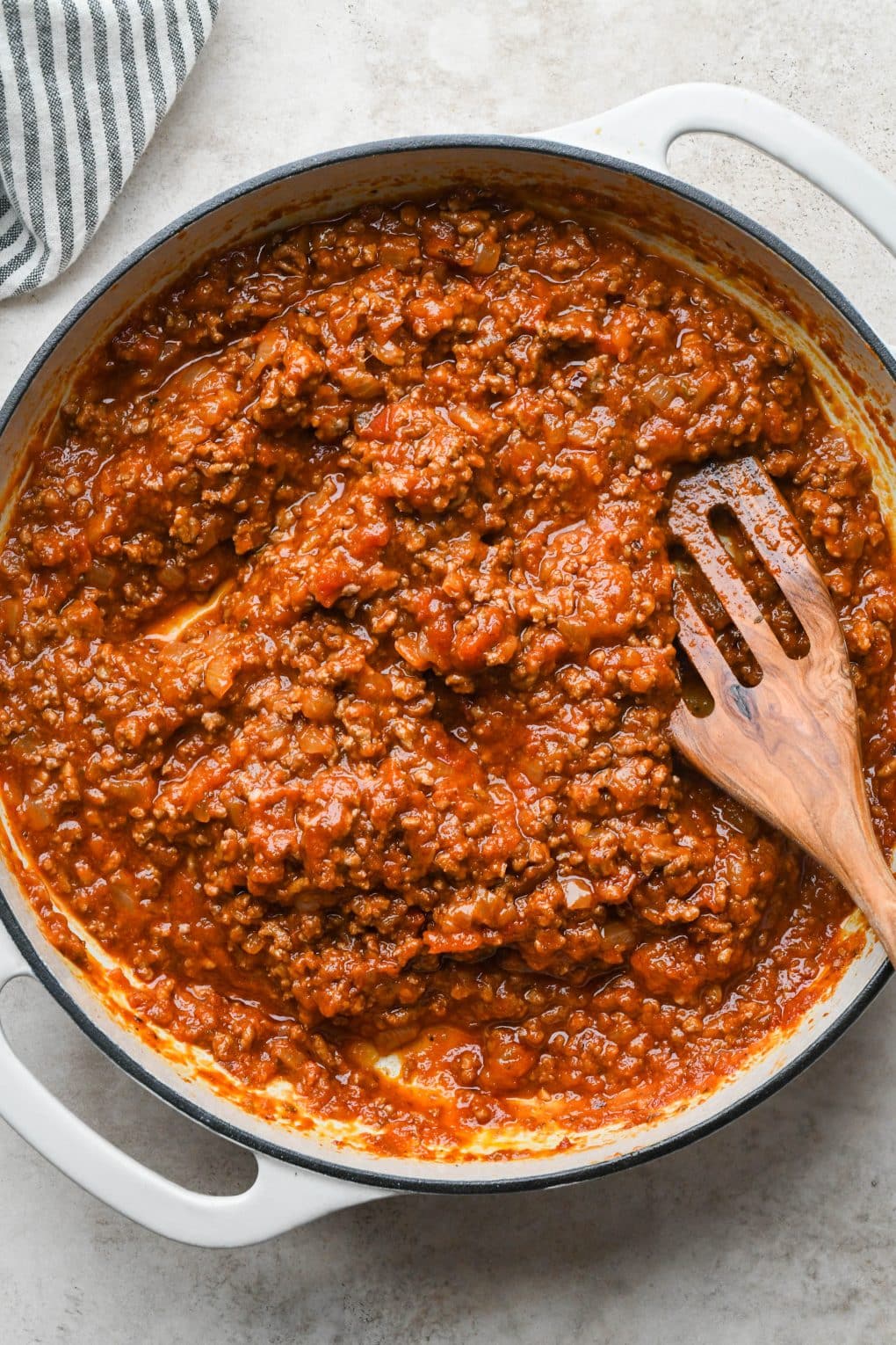 How to make Easy Marinara Sauce with Ground Beef: Meat sauce slightly reduced in large skillet, after simmering for a while.
