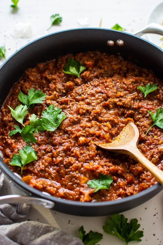 This super easy marinara sauce with ground beef is a healthy, short cut version of a classic full flavored meat sauce! Ready in 30 minutes FLAT for a healthy meal option that's gluten free, paleo, and whole30 friendly.