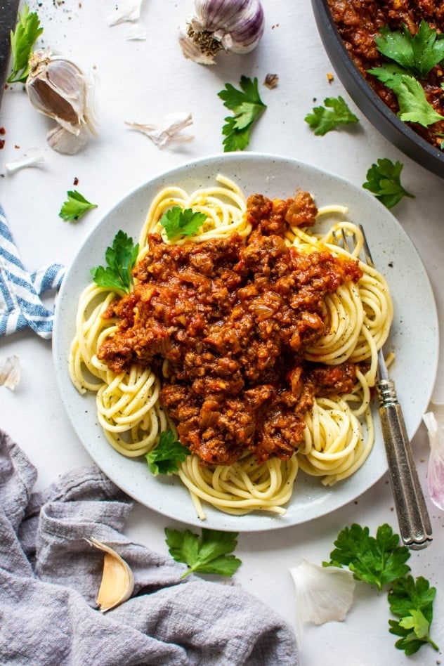 This super easy marinara sauce with ground beef is a healthy, short cut version of a classic full flavored meat sauce! Ready in 30 minutes FLAT for a healthy meal option that's gluten free, paleo, and whole30 friendly.