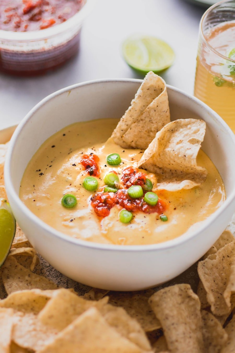 This creamy cashew queso dip is made with ZERO processed ingredients, for an authentic tasting, full flavored, dairy free alternative to this well loved dip. SO crave worthy and made with anti-inflammatory, good-for-you ingredients! Vegan + whole30 compliant.
